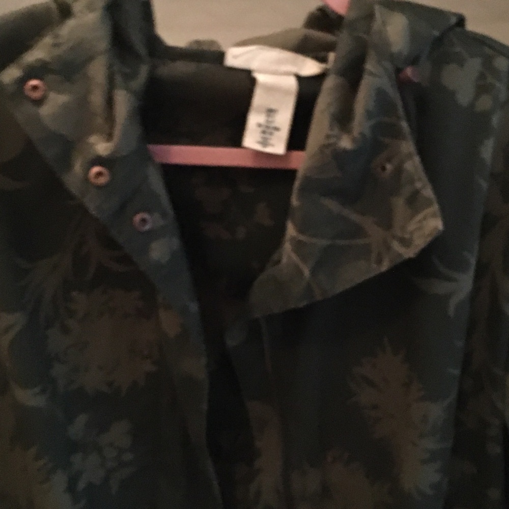 Green trench or rain coat